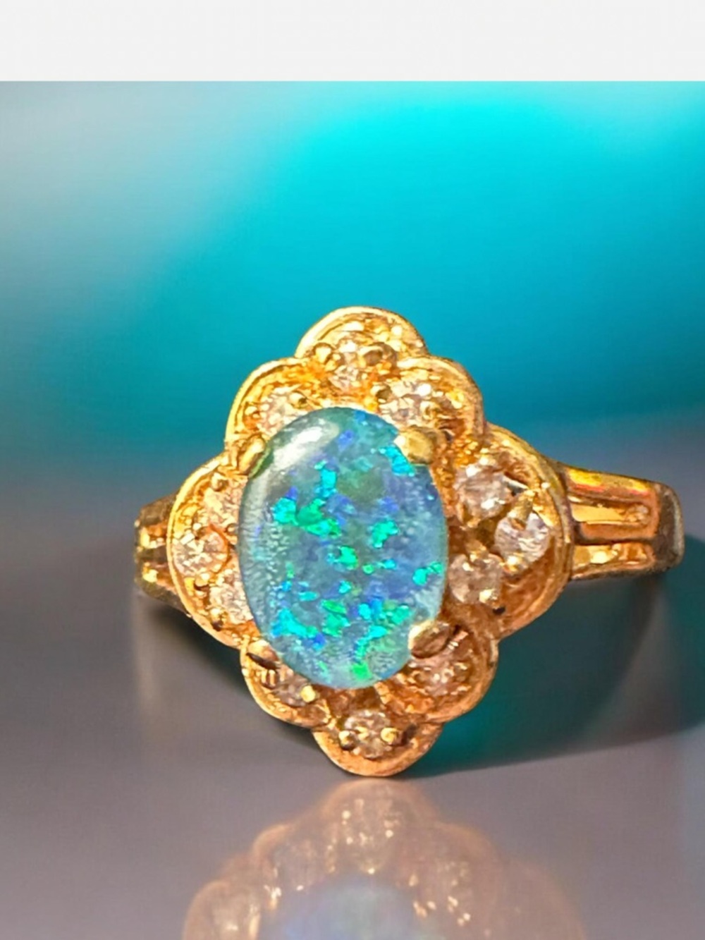 Elegant Gold and Green Gemstone Ring